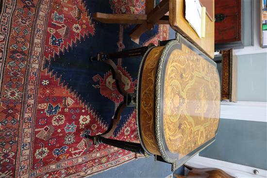 A Louis XVI style marquetry inlaid centre table, with shaped X stretcher W.127cm